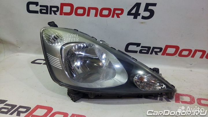 Фара головного света правая б/у для Honda Jazz (21