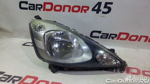 Фара головного света правая б/у для Honda Jazz (21