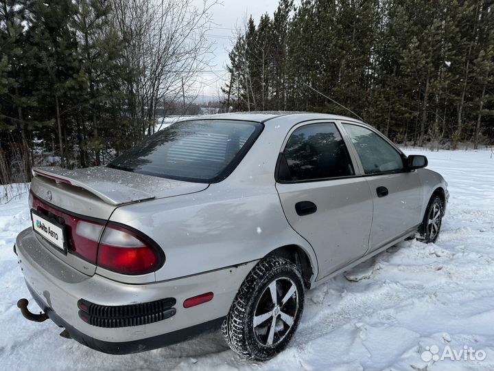 Mazda Familia 1.5 МТ, 1997, 234 000 км