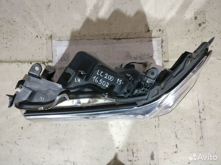 Фара Левая 15- Toyota Land Cruiser 200 Бу оригинал