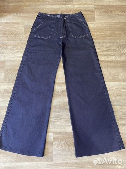 Джинсы клеш от бедра 44-46