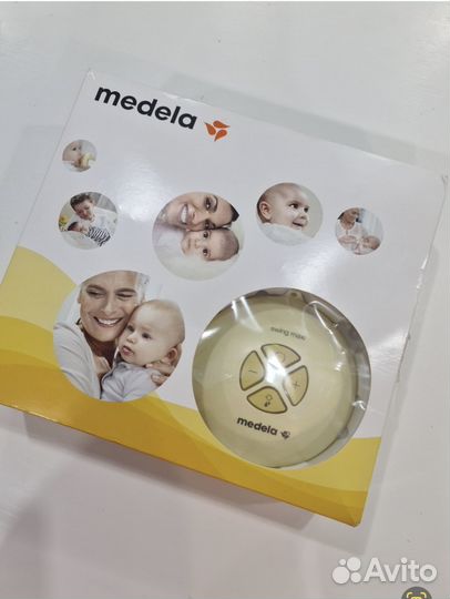 Молокоотсос medela электрический