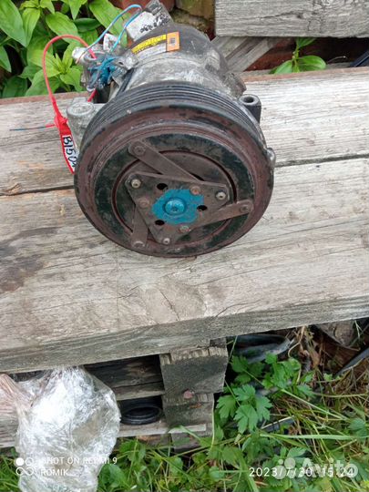 Nissan Almera N16 Компрессор кондеционера