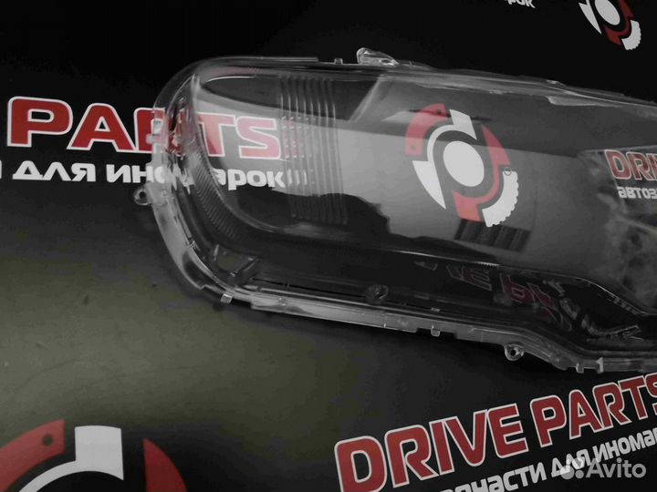 Стекло фары Mitsubishi Lancer 10 2007-2015 левое
