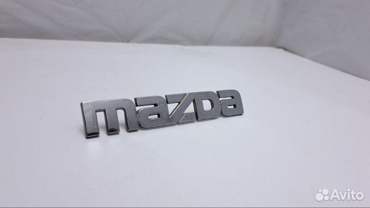 Эмблема задняя Mazda Familia BJ 1.5 ZL 2002