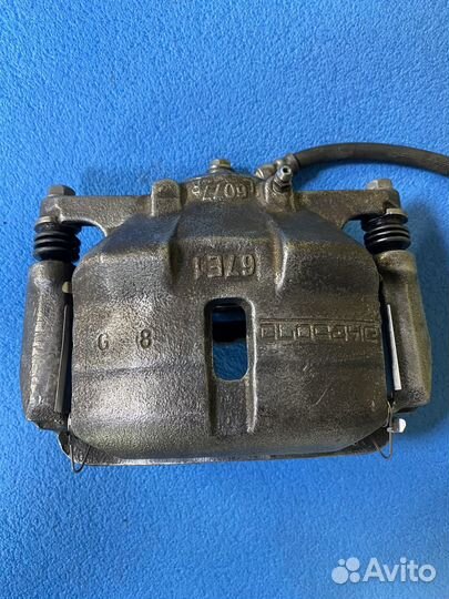 Суппорт тормозной перед. левый Nissan X-Trail T32