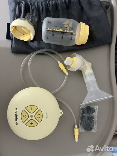 Молокоотсос medela электрический