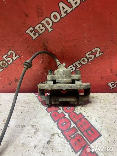 Суппорт тормозной передний левый Renault Sandero 2