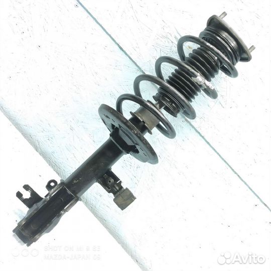 Передний правый амортизатор на Mazda Cx-5
