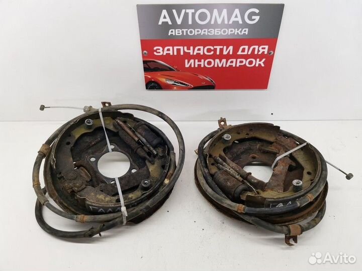 Щит опорный задний левый (Mitsubishi Galant)