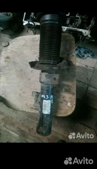 Амортизатор передний Мазда 3 вк