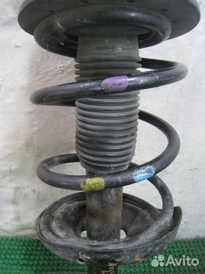 Стойка амортизатора передняя правая Subaru Legacy