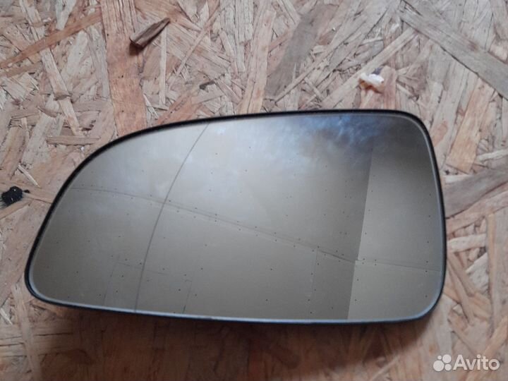 Зеркало на опель астра левое