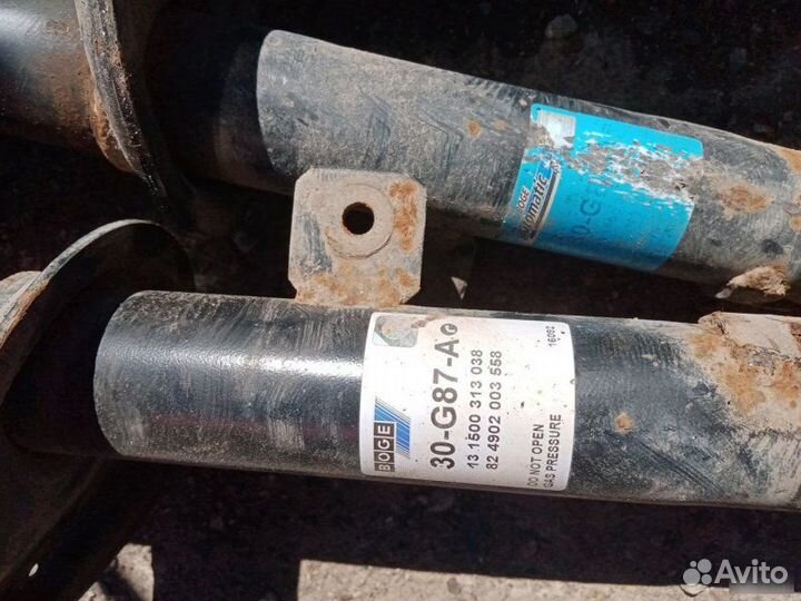 Амортизатор передний Peugeot 206 хэтчбек 2004