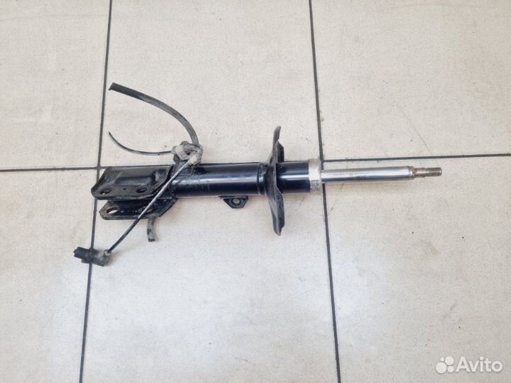 Амортизатор передний левый Toyota Avensis 2.0