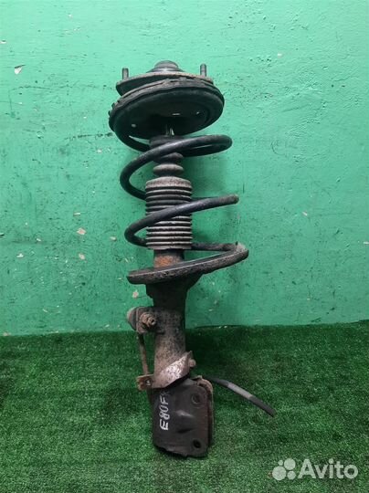 Стойка амортизатора передняя правая Mitsubishi Gr