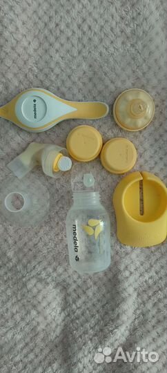 Молокоотсос medela ручной