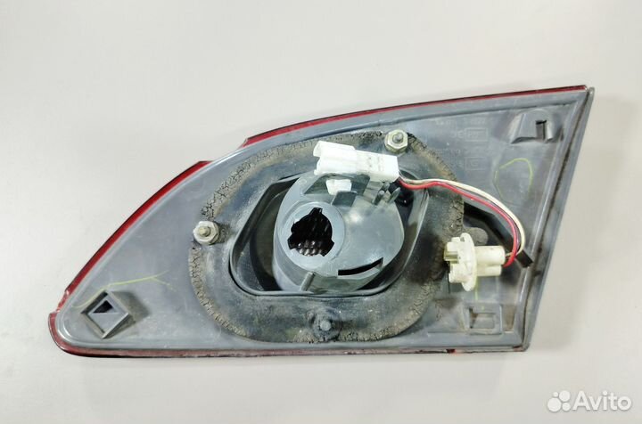 Фонарь в багажник левый Toyota Corolla ZZE110 USA