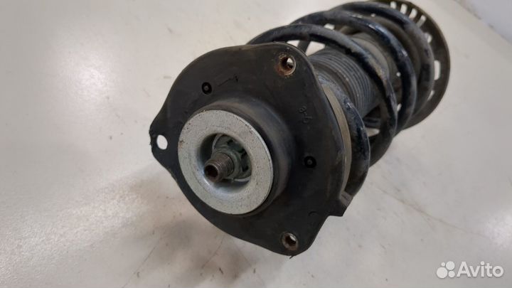 Амортизатор подвески левый передний Volkswagen Passat 6