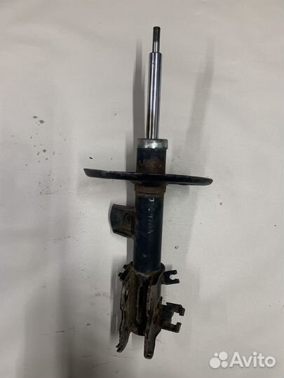 Амортизатор перед левый Teana j32