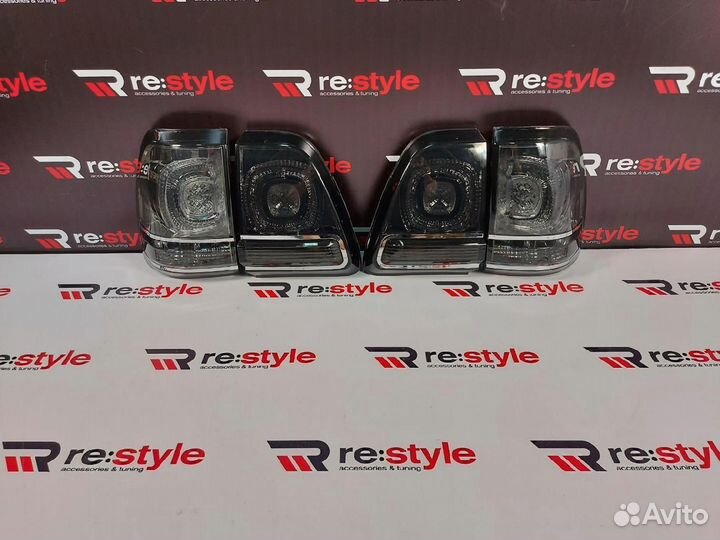 Стопы Toyota Land Cruiser 100 дымчатые S1826