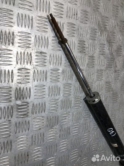 Амортизатор задний правый Nissan Tiida c11