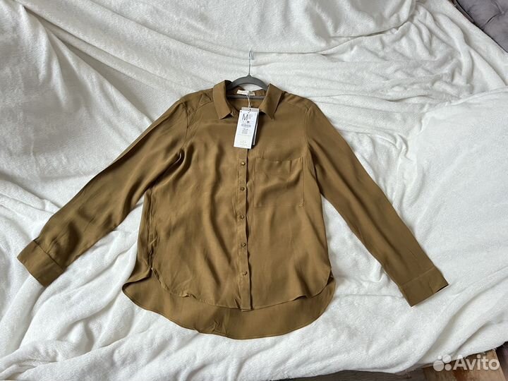 Блузки новые