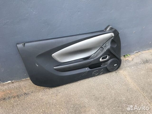 Обшивка двери левой Chevrolet Camaro V 10-15