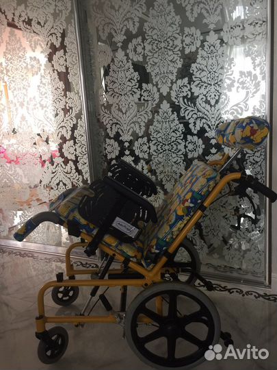 Детская инвалидная коляска