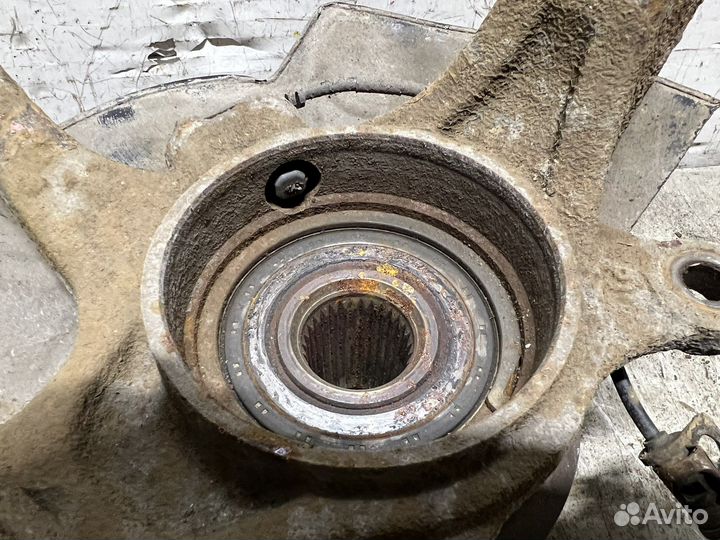 Кулак передний левый Kia Sportage 3 SL 10-16г