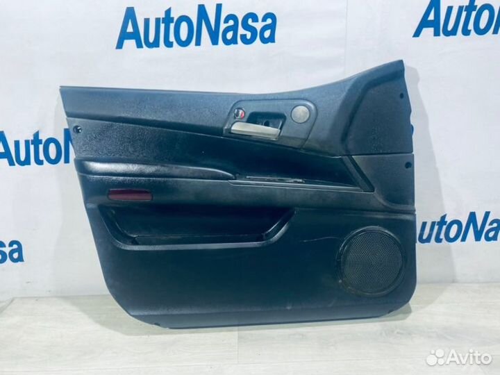 Обшивка двери передняя левая Ssang Yong Kyron