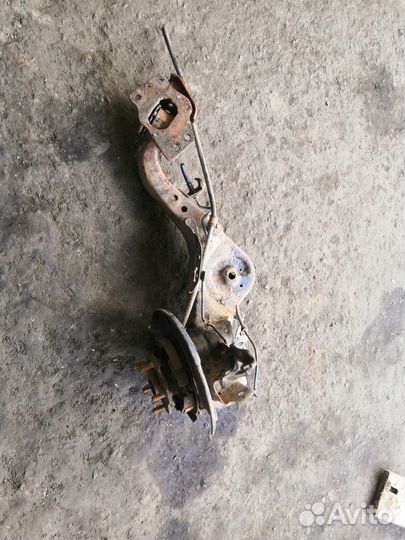 Рычаг задний продольный левый Nissan Qashqai+2