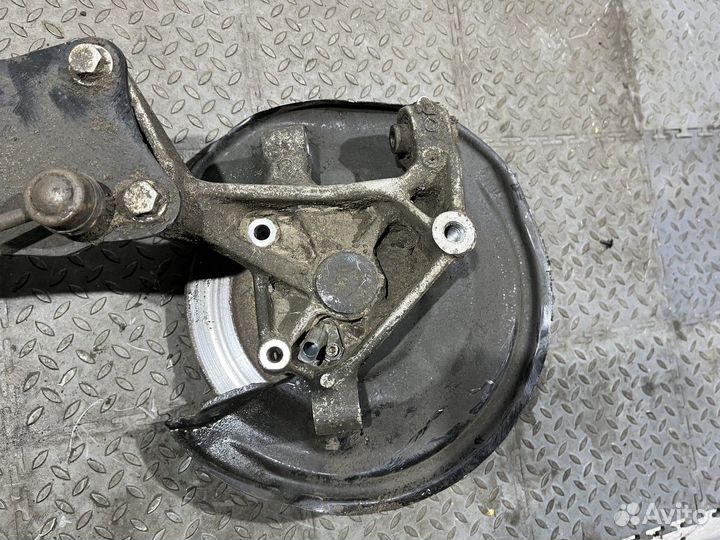 Кулак поворотный задний левый