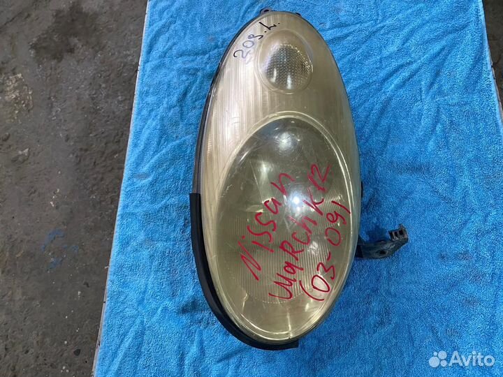 Фара левая Nissan March К12
