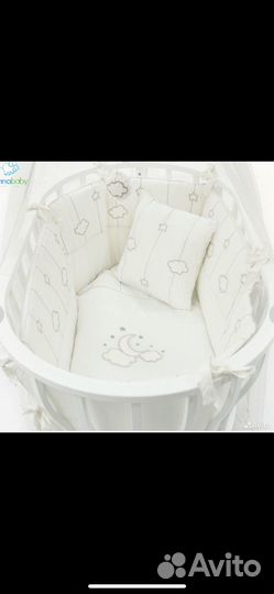 Детская кроватка с маятником