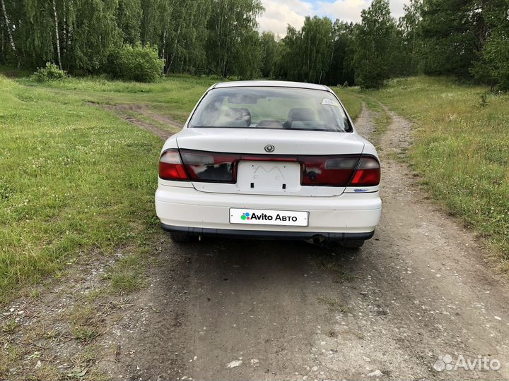 Mazda Familia 1.5 AT, 1997, 360 000 км