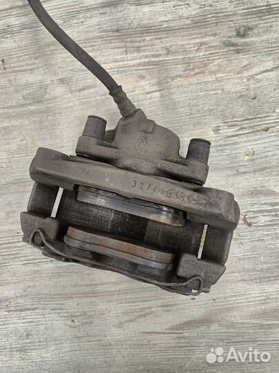 Суппорт тормозной передний левый Renault Megane 3