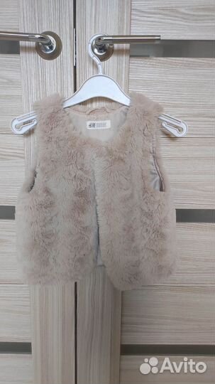 Меховая жилетка