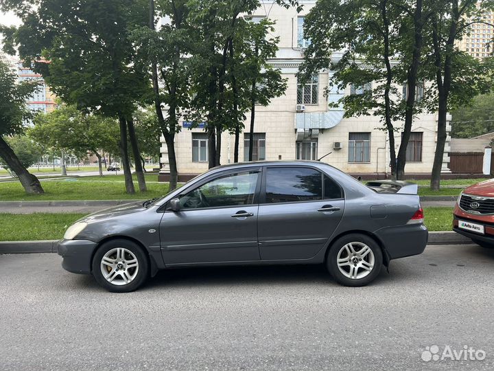 Mitsubishi Lancer 1.6 МТ, 2006, 264 000 км