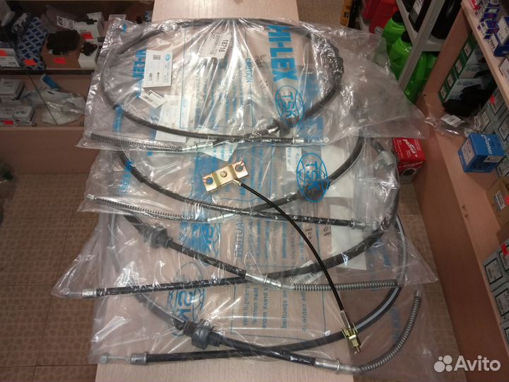 Тросик ручника Mitsubishi Lancer