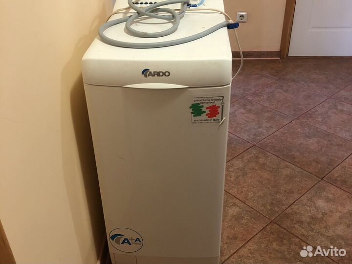 Стиральная машина с вертикальной загрузкой