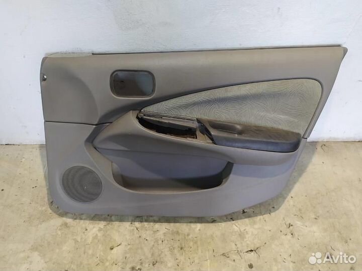 Обшивка передней правой двери Nissan Almera N16