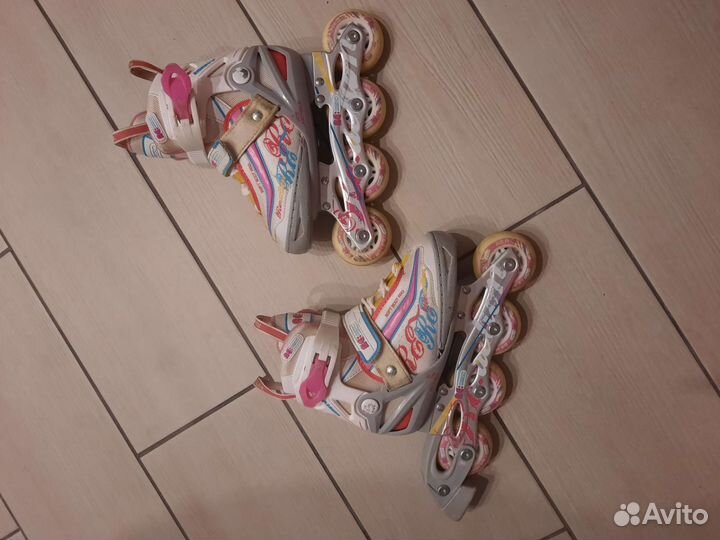 Роликовые коньки