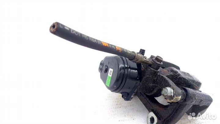 Суппорт тормозной задний правый Kia K5 DL3 G4KN