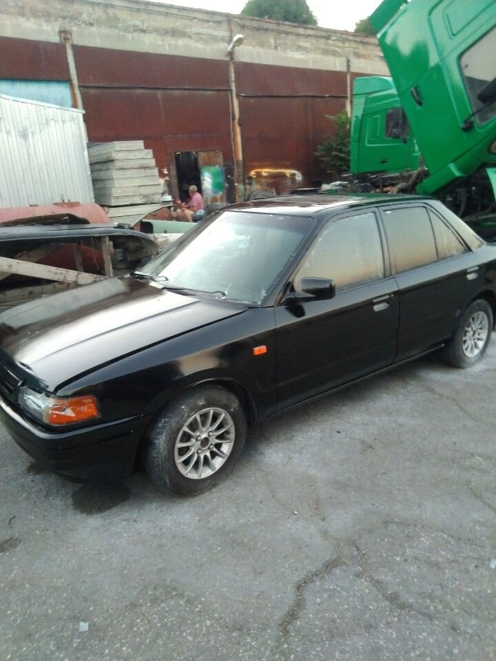 Mazda Familia: фото владельца