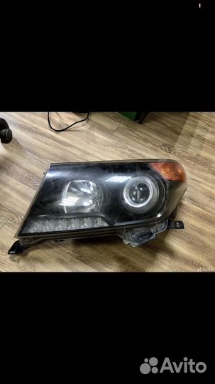 Левая фара LC 200 оригинал