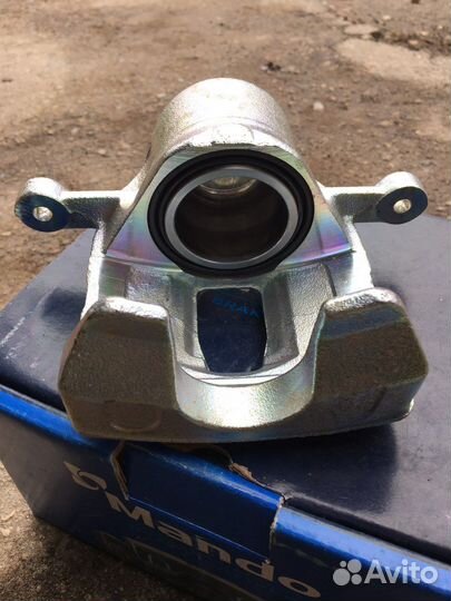 Суппорт передний левый solaris