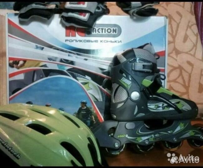 Роликовые коньки