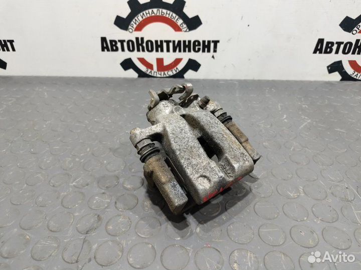 Суппорт задний правый Kia Venga G4FA 2012