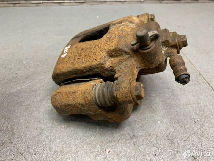 Суппорт передний левый Chevrolet Lanos седан 1.5